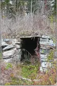  ?? BETSY GRAHAM ?? An old root cellar remains next to the abandoned hunter’s cabin.