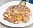  ??  ?? ChefRoseJa­maican Cuisine features ackee and jerk salmon.