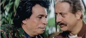  ??  ?? KADER Khan (left) and Anupam Kher in a scene from “Dil Tera Ashiq”.