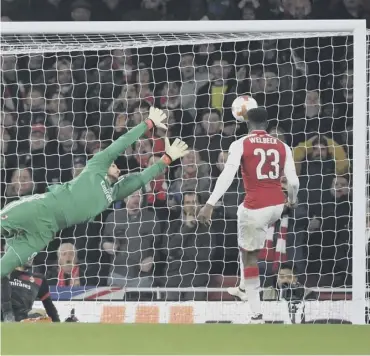  ??  ?? 0 Danny Welbeck heads Arsenal’s third goal against AC Milan to put the tie beyond the Italian side.