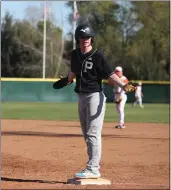  ?? CARLOS GUERRERO — DAILY DEMOCRAT ?? Pioneer High School's Landon Dahler reaches first base safely during the Patriots Golden Empire League matchup against Woodland High School on March 19, at Clark Field.