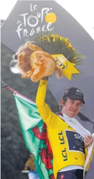  ?? THE ASSOCIATED PRESS ?? Geraint Thomas of Wales celebrates after winning the Tour de France on Sunday in Paris.