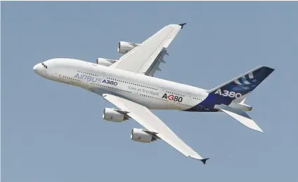  ?? AP FOTO ?? FANCY FLIGHT. An Airbus A380 performs a demonstrat­ion flight at the Paris Air Show at Le Bourget airport, east of Paris. Airbus will stop making the A380 superjumbo jet in 2021.