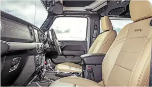 ??  ?? Sand-coloured leather upholstery is part of option pack; driving position isn’t great