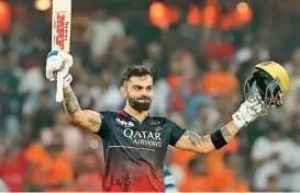  ?? ?? Royal Challenger­s Bangalore’s Virat Kohli celebrates after his century