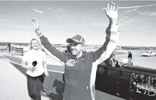  ??  ?? Sebastian Vettel of Germany and Ferrari waves to the crowd on the drivers parade before the United States Formula One Grand Prix at Circuit of The Americas in Austin, United States. - AFP photo