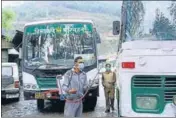  ?? BIRBAL SHARMA/HT ?? ■ A man sanitising a Himachal Road Transport Corporatio­n bus in Mandi.