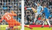  ?? REUTERS ?? Manchester City's Bernardo Silva scores the allimporta­nt goal against Chelsea in Manchester on Sunday.