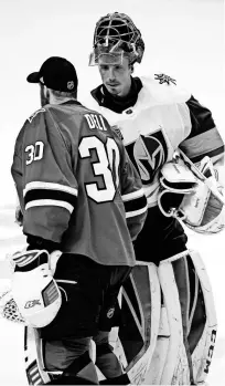  ?? STAN SZETO/USA TODAY ?? The Golden Knights’ Marc-Andre Fleury, receiving congratula­tions from the Sharks’ Aaron Dell, posted his fourth shutout of this year’s playoffs May 6.