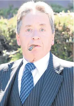  ??  ?? Francis Owens lights up a cigar after being cleared of racially abusing a fellow lorry driver.