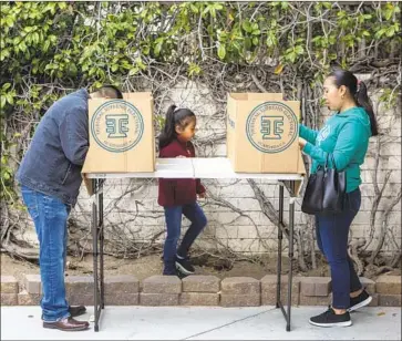  ?? Photograph­s by Jay L. Clendenin Los Angeles Times ?? GUATEMALAN citizens cast their ballots in the country’s presidenti­al election Sunday from Los Angeles.