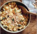  ?? PHOTO BY CHRISTOPHE ROUE ?? Orecchiett­e pasta is served with hazelnuts, whose somewhat bitter skin can be removed more easily after roasting.