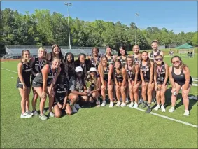  ?? Calhoun high school track and field ?? The Calhoun High School boys track and field team had a great day last week at the Region 7-5A meet in Roswell. Led by Dylan Faulkner’s four individual wins, the Yellow Jackets will have a large group of athletes at Saturday’s sectional meet. The Calhoun High School girls take a minute for a picture after competing at the Region 7-5A meet last week in Roswell. The Lady Yellow Jackets will send a number of girls to this Saturday’s Sectional meet with everyone looking to qualify for the 5A state meet the following week.