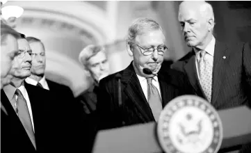  ??  ?? Senate Majority Leader Mitch McConnell, accompanie­d by (left to right) Sen Lindsey Graham, Sen John Barrasso, Sen John Thune, Sen Bill Cassidy and Sen John Cornyn, speaks with reporters following the party luncheons on Capitol Hill in Washington, US. —...