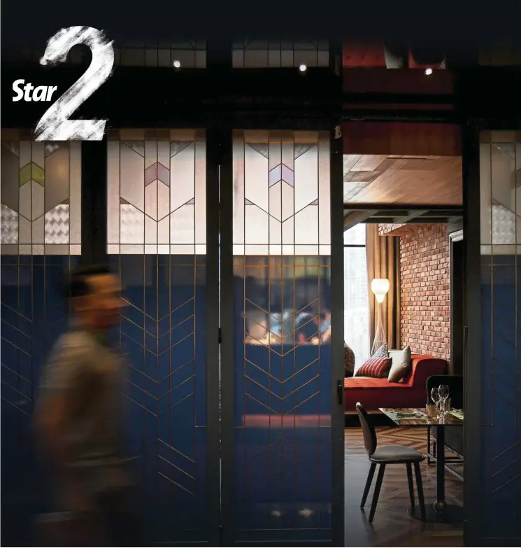  ??  ?? Sliding Art Deco doors hide the various private spaces at Mr Chew’s Chino Latino Bar. — YAP CHEE HONG/The Star