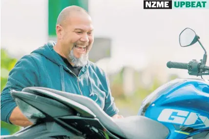  ??  ?? Mental health worker Michael Nu’u says winning the motorbike in the “magic” BP carwash was amazing.