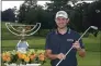  ?? BRYNN ANDERSON — THE ASSOCIATED PRESS ?? Patrick Cantlay poses with the trophies after winning the Tour Championsh­ip and FedEx Cup at East Lake Golf Club on Sept. 5 in Atlanta.