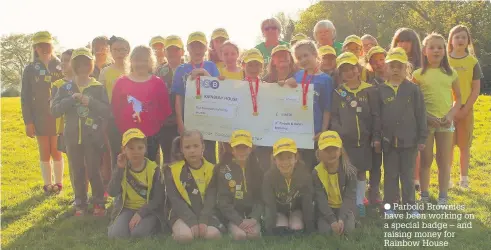  ?? Parbold Brownies have been working on a special badge – and raising money for Rainbow House ??