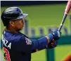  ?? JOHN BAZEMORE/AP ?? Ehire Adrianza has been the Braves’ most productive player in the past month. The nonroster invitee entered Monday hitting .455 after doubling twice Sunday.