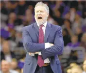  ?? MATT SLOCUM/ AP ?? Philadelph­ia 76ers coach Brett Brown has an improved roster, thanks to Sixers GM Elton Brand. Now Brown has to put it all together on the court.