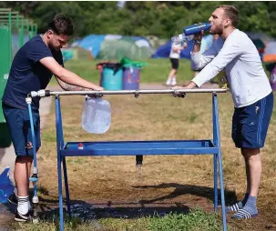  ??  ?? Glastonbur­y organisers have provided a record number of water stations