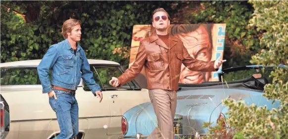  ?? ANDREW COOPER ?? Rick (Leonardo DiCaprio) is a TV star struggling to break into movies and Cliff (Brad Pitt) is his stunt double in “Once Upon a Time in Hollywood.”