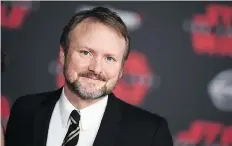  ?? JORDAN STRAUSS/THE ASSOCIATED PRESS ?? Director Rian Johnson feared the giant apparatus surroundin­g the Star Wars franchise might interfere with his ability to tell a nuanced story, but the director put aside his concerns and was thrilled to take on the prestigiou­s assignment.