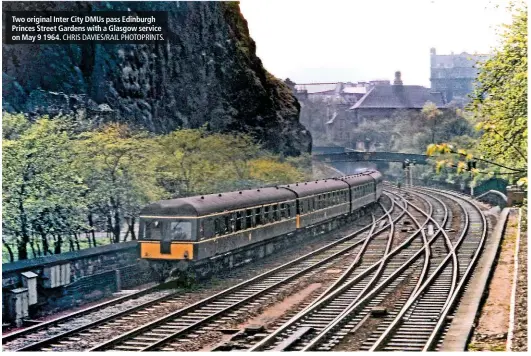  ?? CHRIS DAVIES/RAIL PHOTOPRINT­S. ?? Two original Inter City DMUs pass Edinburgh Princes Street Gardens with a Glasgow service on May 9 1964.