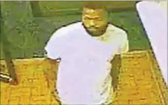  ?? SURVEILLAN­CE IMAGE ?? Police released this image of the man suspected in triple shooting in Colwyn Friday night.