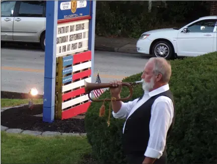  ?? BOB KEELER - MEDIANEWS GROUP ?? Curry Moyer plays “Taps” on a Civil War-era clarion at Saturday’s Service of Remembranc­e at Warren Royer Post 234America­n Legion in Souderton.