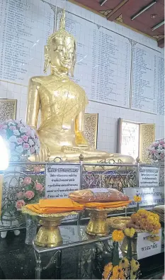  ??  ?? Wat Yang had existed long before Lao migrants settled down around the temple during the early Rattanakos­in period. It was named ‘yang’ meaning stop because its principal Buddha image Luang Phor To, a carved wooden Buddha statue in the Subduing the Mara...