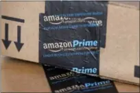  ?? AP PHOTO/ROSS D. FRANKLIN, FILE ?? This June 4, 2014, file photo shows Amazon boxes in Phoenix. Pennsylvan­ia politician­s hope to lure Amazon’s second headquarte­rs to the state.