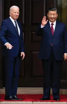  ?? ?? US President Joe Biden greets China’s President President Xi