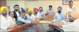  ?? HT ?? AAP nominee Maj Gen Suresh Khajuria (retd), accompanie­d by party leaders Sukhpal Singh Khaira and Bhagwant Mann, filing his nomination­s to DC Gurlovelee­n Singh Sidhu in Gurdaspur on Wednesday.