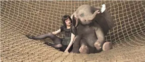  ?? DISNEY ?? Aerial star Colette Marchant (Eva Green) teams up with a baby elephant who can fly in the new “Dumbo” from director Tim Burton.