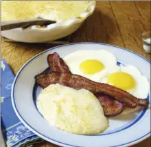  ?? The Associated Press ?? Cheesy baked grits are pictured in New York. This dish is from a recipe by Sara Moulton.