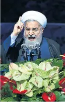  ?? Foto: AP / Ebrahim Noroozi ?? Präsident Hassan Rohani bei seiner Rede zum Jahrestag.