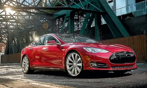  ??  ?? The Model S luxury sedan is the car that has establishe­d Tesla as the world’s most desirable plug-in brand.