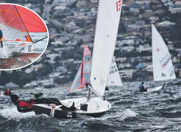  ?? Pictures: JANE AUSTIN ?? FULL THROTTLE: Henry Dennison (main picture) in his Sabre dinghy powers to windward in the Crown Series Bellerive Regatta. And the 29er skiffs (inset top left) also turned on some spectacula­r sailing in the event.