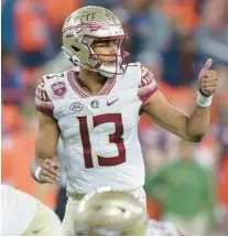  ?? BESSEX/AP JOSHUA ?? Florida State quarterbac­k Jordan Travis indicated that he has some unfinished business to take care of, including winning a championsh­ip — which is why he decided to come back to the Seminoles for 2023.