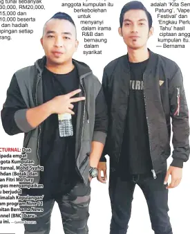  ?? — Gambar Bernama ?? NOCTURNAL: Dua daripada empat anggota Kumpulan Nocturnal, Mohd Syafiq Shahdan (Botak) dan Afnan Fitri Md Jury selepas menyampaik­an lagu berjudul ‘Terimalah Kepulangan’ dalam program Nine 11 terbitan Bernama News Channel (BNC) barubaru ini.