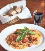  ??  ?? Spaghetini con pomodorini and basilico from Andreoli Italian Grocer in Scottsdale.