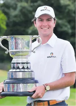  ?? Picture: Getty Images ?? DESTINED FOR THE TOP. Jovan Rebula with the Freddie Tait Cup for the leading amateur finisher in the South African Open, the nephew of Ernie Els beating off three other amateurs who made the cut. Rebula finished on six-under-par, in a tie for 24th overall, two strokes behind his uncle.