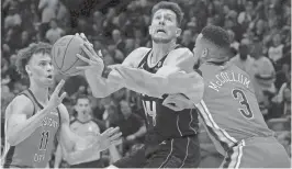 ?? MATTHEW HINTON/USA TODAY ?? New Orleans Pelicans guard CJ McCollum (3) steals the ball from Phoenix Suns forward Drew Eubanks (14).