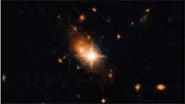  ?? HANDOUT PHOTO BY NASA, ESA, AND M. CHIABERGE-STSCI AND JHU ?? The Hubble Space Telescope image that revealed the runaway quasar.