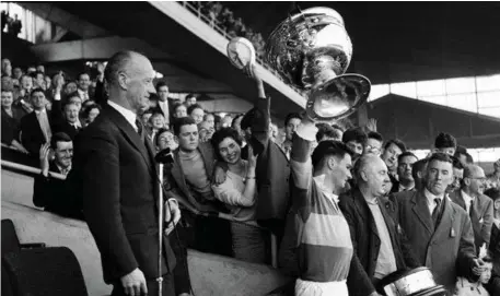  ??  ?? Above; Mick O’Connell lifts Sam at the 1959 All Ireland Final.