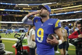  ?? ASHLEY LANDIS — THE ASSOCIATED PRESS ?? Los Angeles Rams quarterbac­k Matthew Stafford walks off the field after a win over the New Orleans Saints Thursday in Inglewood.