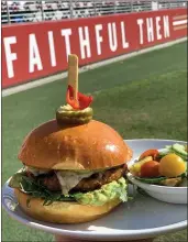  ?? COURTESY MARIO BEABRAUT ?? At Michael Mina’s Bourbon Pub at Levi’s Stadium, executive chef Mario Beabraut’s turkey burgers come topped with guacamole and mizuna and tucked into a toasted brioche bun.