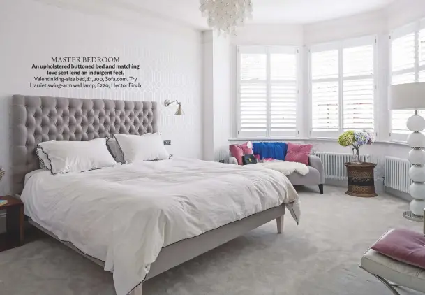  ??  ?? MASTER BEDROOM an upholstere­d buttoned bed and matching love seat lend an indulgent feel. Valentin king-size bed, £1,200, sofa.com. try Harriet swing-arm wall lamp, £220, Hector finch