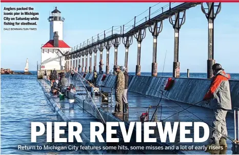  ?? DALE BOWMAN/SUN-TIMES ?? Anglers packed the iconic pier in Michigan City on Saturday while fishing for steelhead.